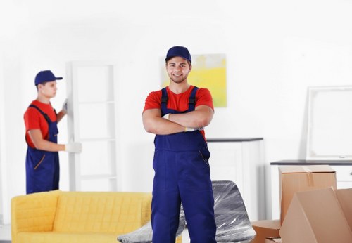 Removal van and movers preparing a home move in Roehampton