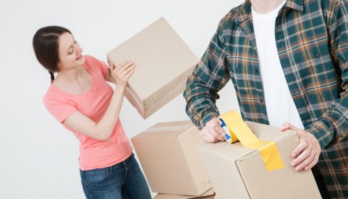 Removal team handling furniture during a Roehampton relocation