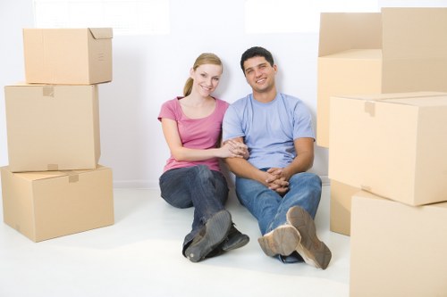 Professional office relocation team handling equipment in Roehampton