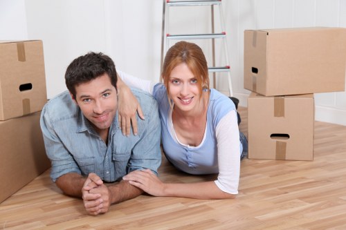 Local Roehampton movers handling labelled boxes during a residential relocation