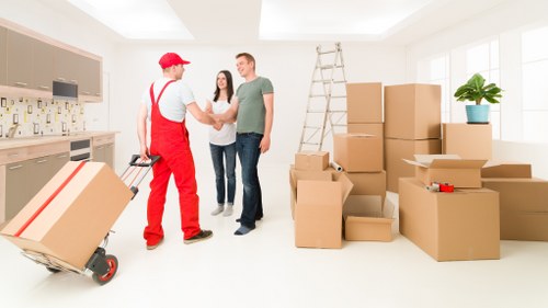 Local Roehampton moving team handling household items with care