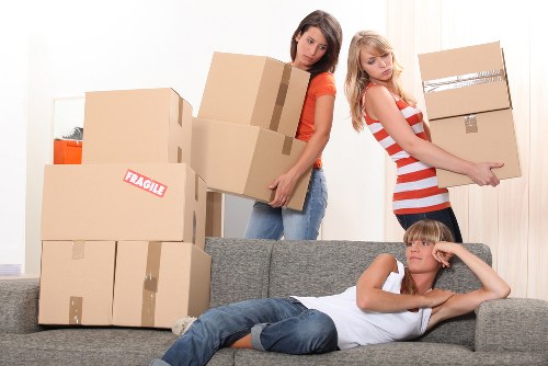 Unpacking services in Roehampton organising household items in a new home