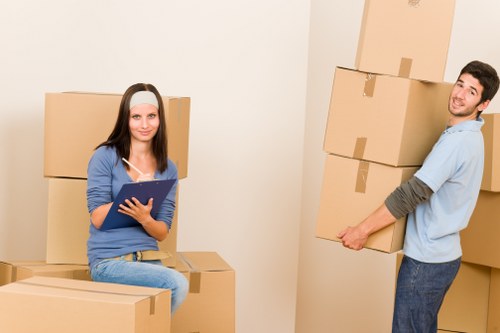 Packed furniture and protected items prepared for transport by movers