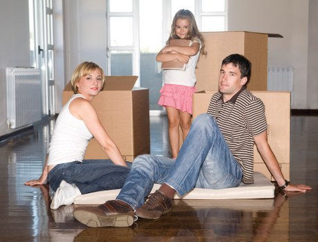Local Roehampton movers navigating a residential street with a moving van